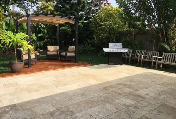 a view of a backyard with a sitting area