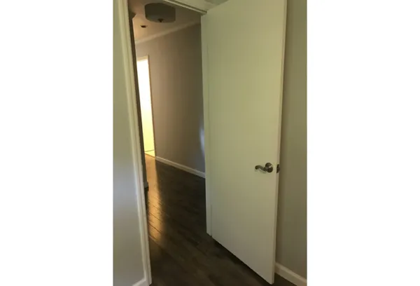 a bathroom with a glass shower door