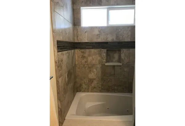 a bathroom with a bathtub