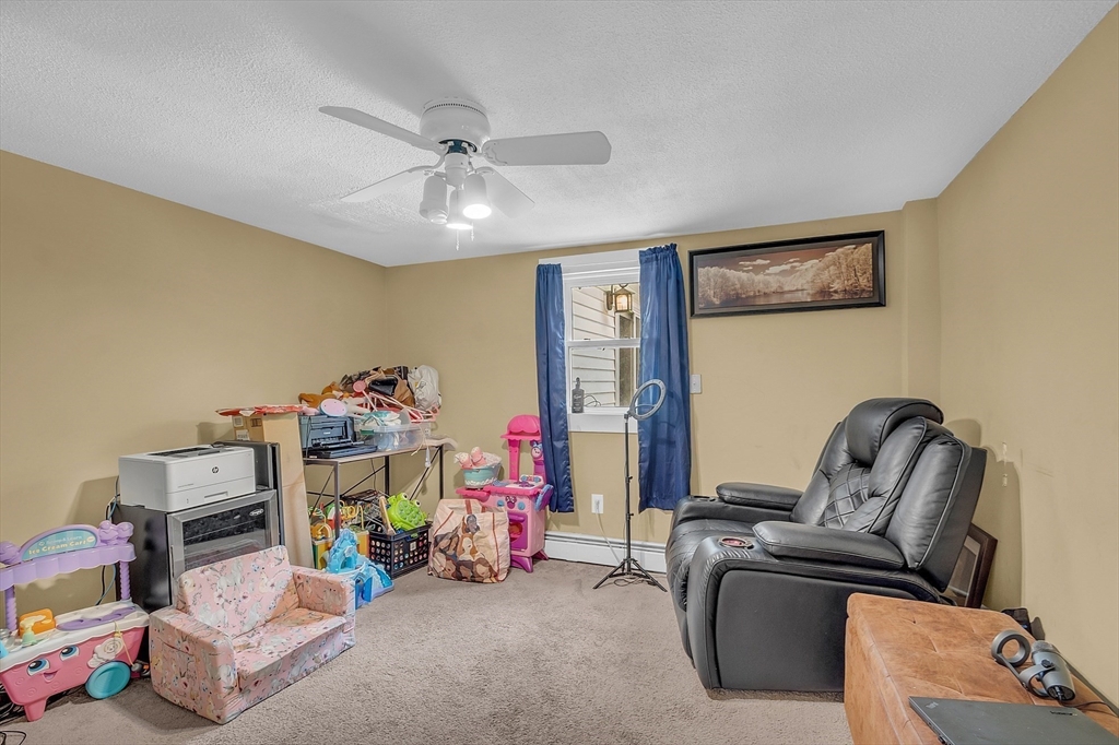 296 Howe Street Methuen, MA 01844 - Photo 7 of 12 a view of a room with toys