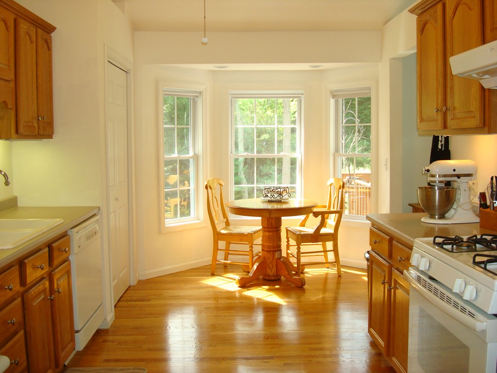 18 Rebecca Road Freetown, MA 02702 - Photo 5 of 30 a view of a dining room with furniture a chandelier and wooden floor