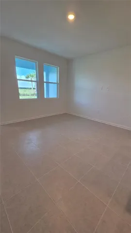 en empty room with windows