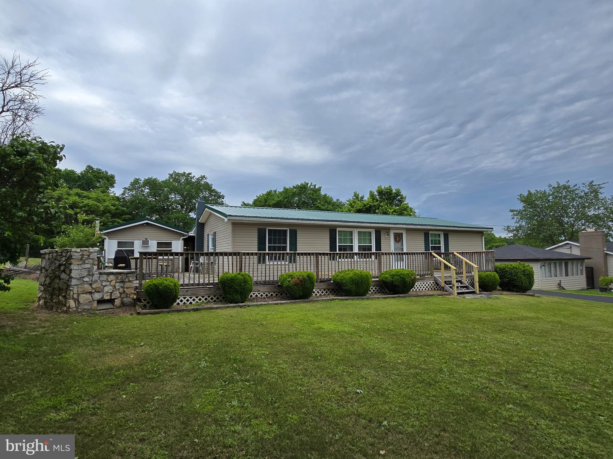 6231 Valley Road Berkeley Springs, WV 25411 - Photo 28 of 34 Front yard and deck