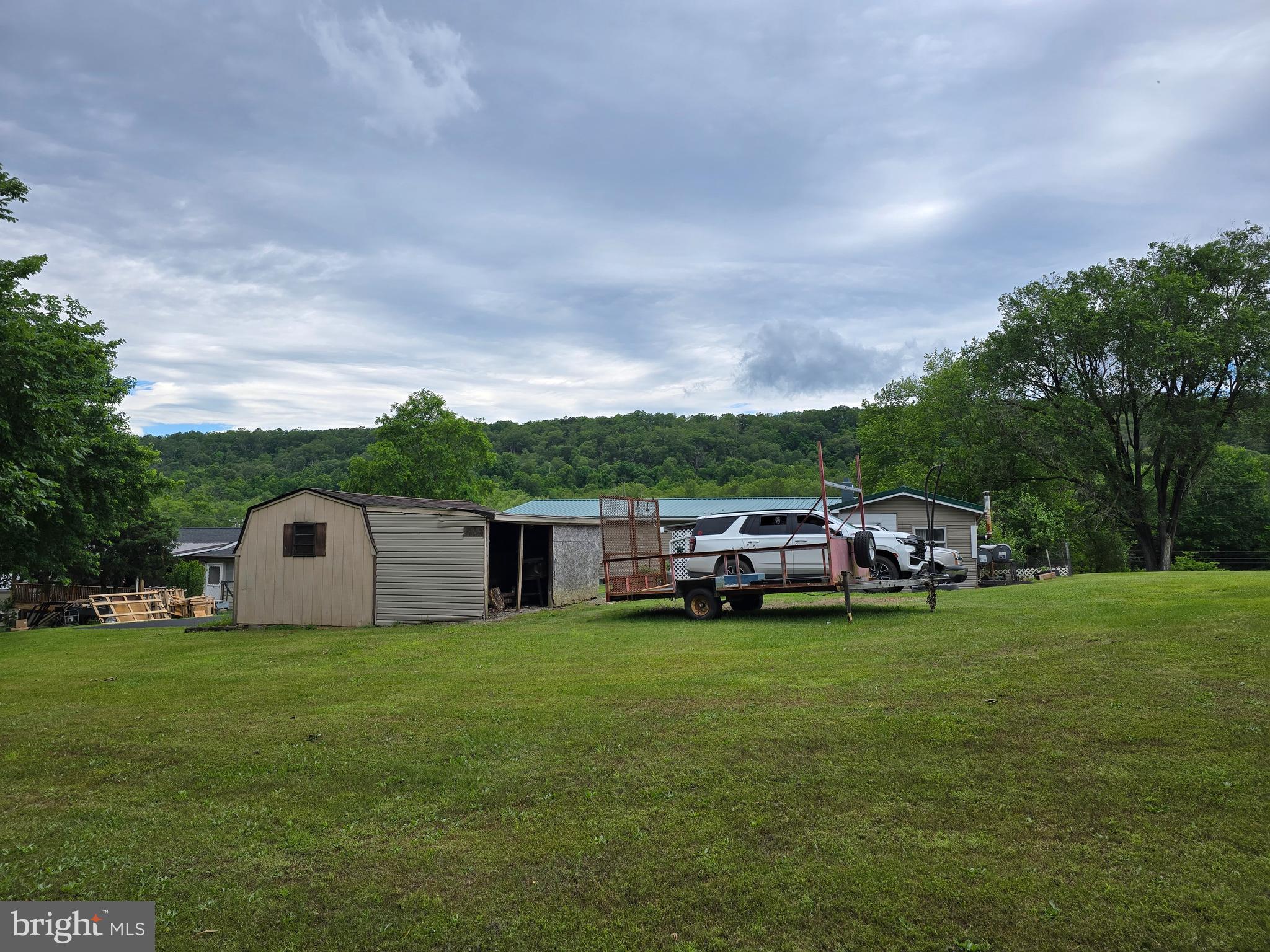 6231 Valley Road Berkeley Springs, WV 25411 - Photo 29 of 34 Rear yard and storage shed