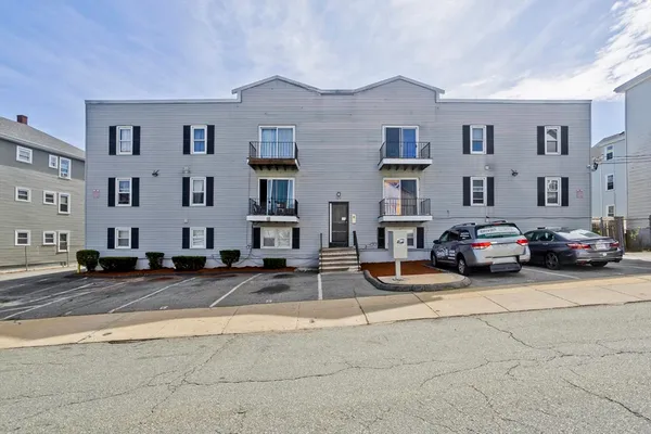 a car parked in front of a building