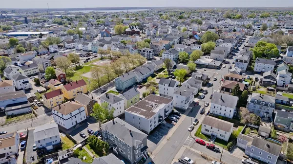 an aerial view of a city with lots of residential buildings
