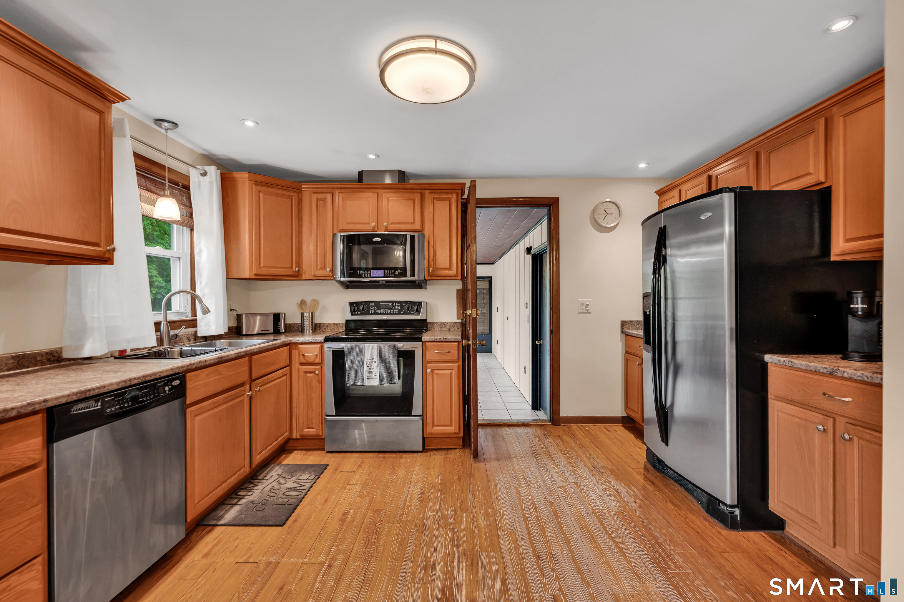 85 Timothy Road Naugatuck, CT 06770 - Photo 9 of 30 a kitchen with stainless steel appliances granite countertop a refrigerator a stove top oven a sink and dishwasher