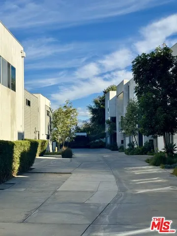 a bathroom with a sink double vanity and a mirror