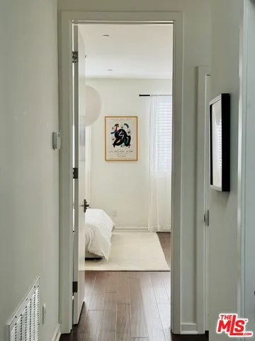 a hallway with a closet