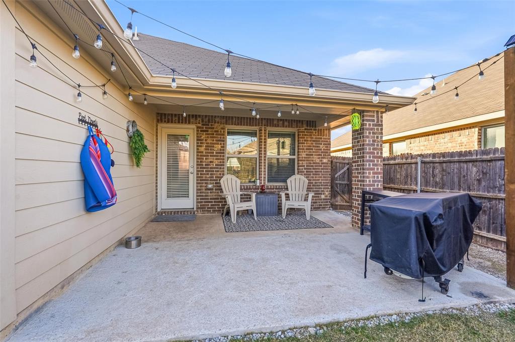 2148 Erika Lane Forney, TX 75126 - Photo 17 of 21 a living room with furniture and a large window
