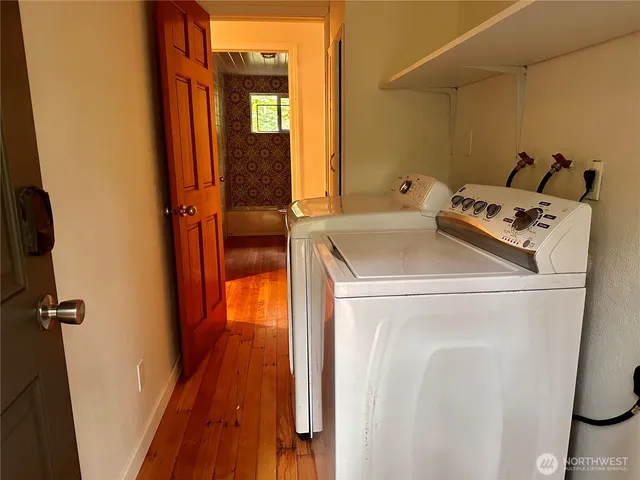 a utility room with dryer and washer