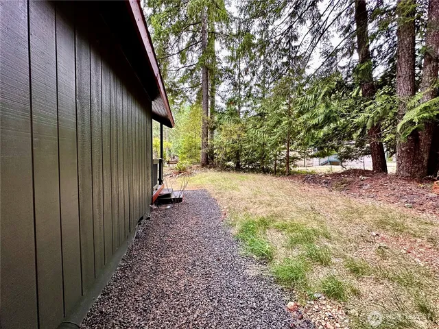 a view of backyard with green space