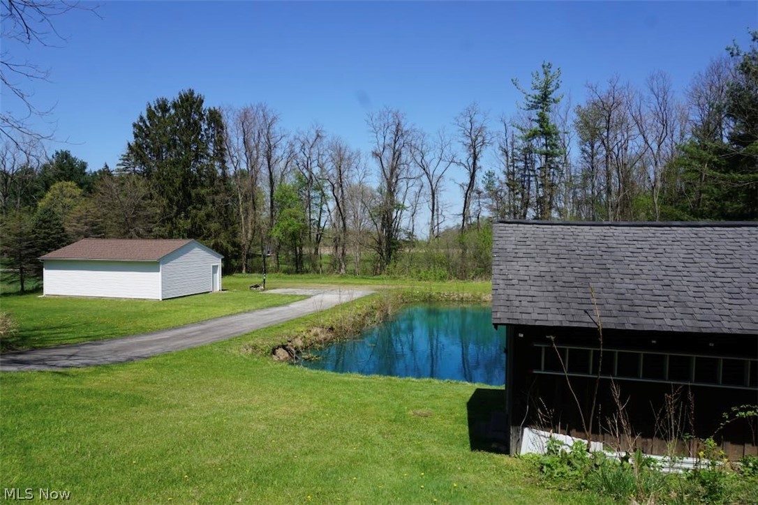 4173 South Ridge Road East Geneva, OH 44041 - Photo 29 of 42 View of rear yard with pond and 2nd garage