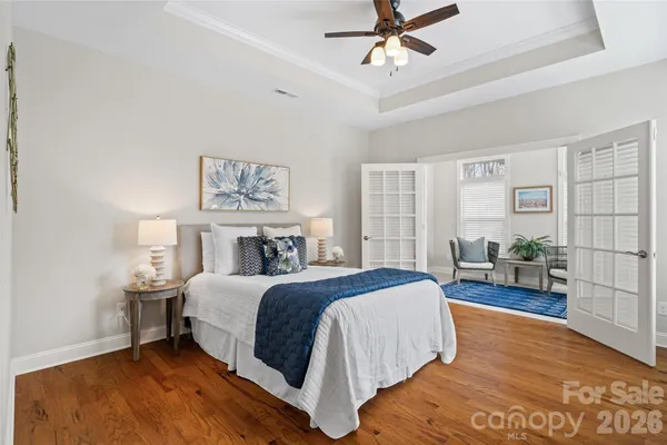 a bed room with a bed and a window