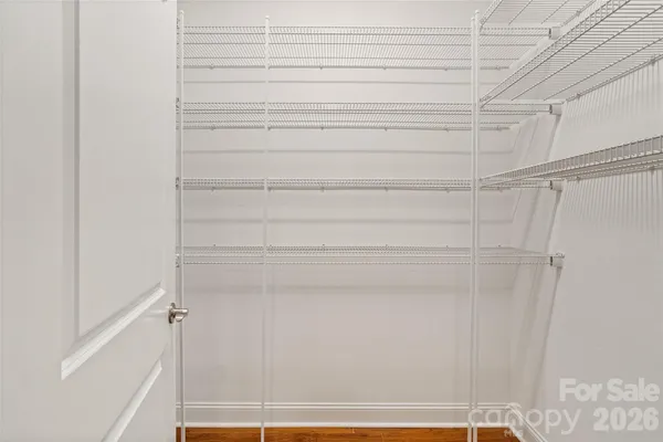a room with a sink and cabinets