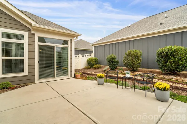 a front view of a house with swimming pool