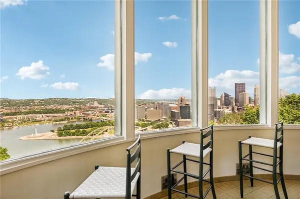 a view of a city from a dining room