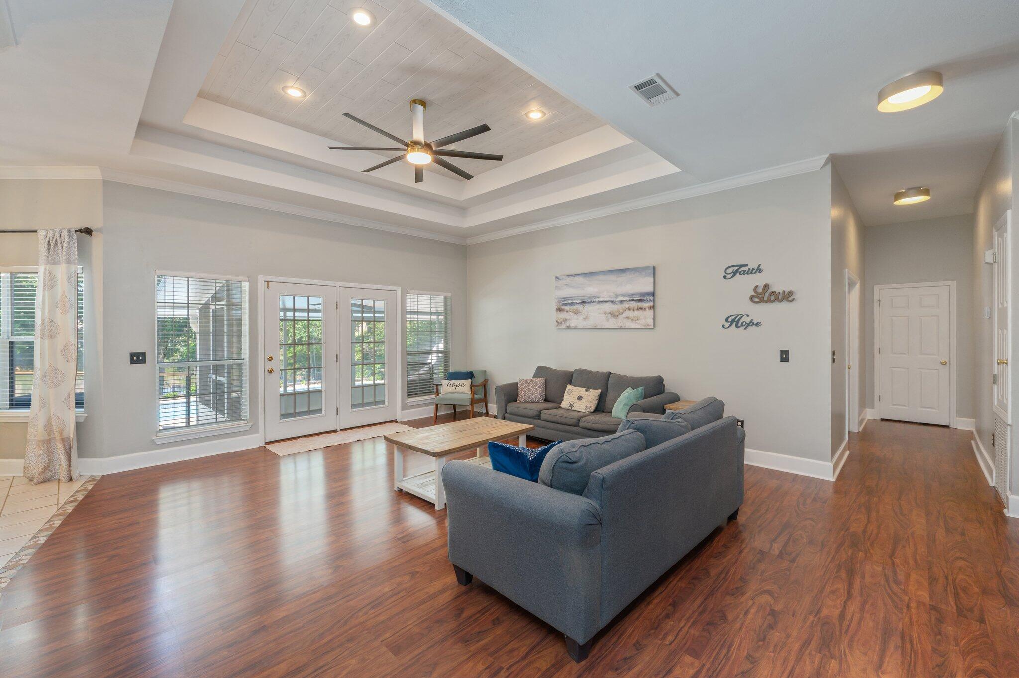 4680 Lovegrass Lane Crestview, FL 32539 - Photo 6 of 49 a living room with furniture and a large window