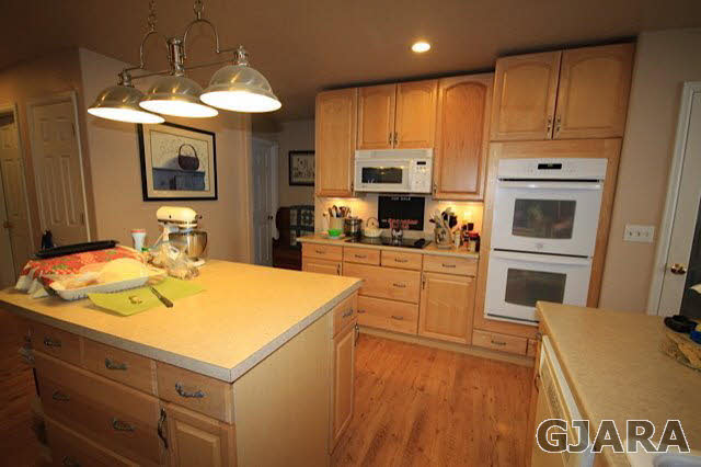 1629 P Road Loma, CO 81524 - Photo 9 of 18 a kitchen with a sink a stove and oven