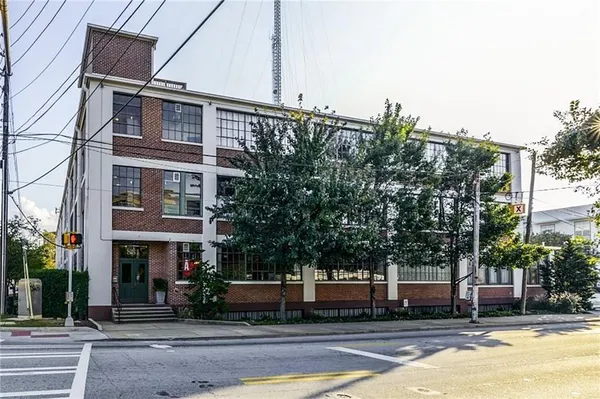 a front view of a building with street view