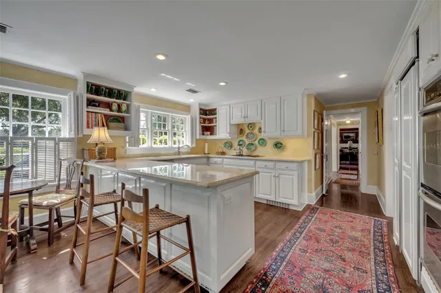 a kitchen with counter top space cabinets and stainless steel appliances