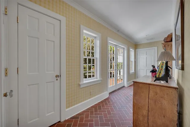 a room with wooden floor and furniture