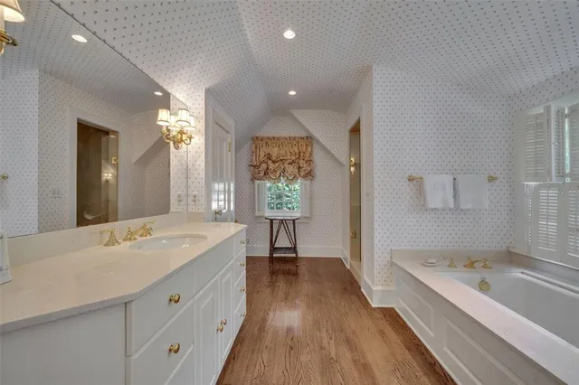 a view of a livingroom with workspace and a window