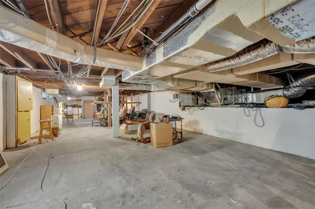 a front view of house with yard patio and green space