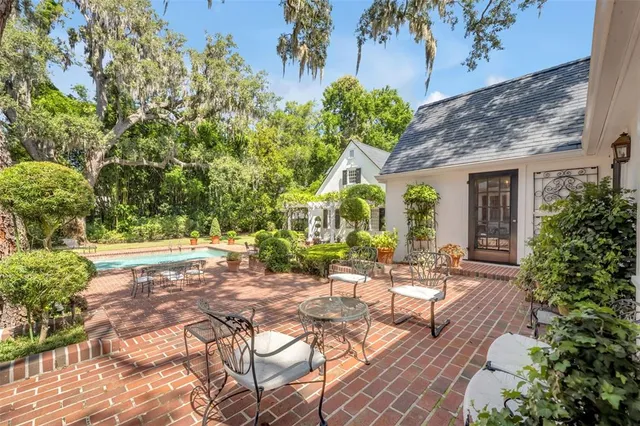 a view of a yard with an outdoor space