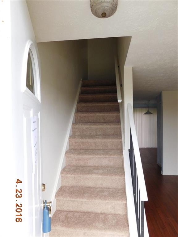 702 Countryside Drive McKees Rocks, PA 15136 - Photo 3 of 15 View from Front Door and stairway to 2nd Floor after New Carpet installed on 4-21-2016