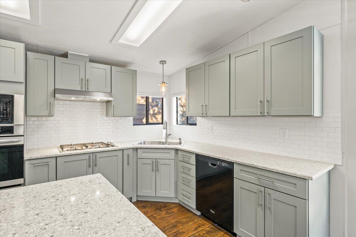 4420 Pleasant Valley Road, Unit 184 Diamond Springs, CA 95619 - Photo 12 of 28 a kitchen with a sink stove and cabinets