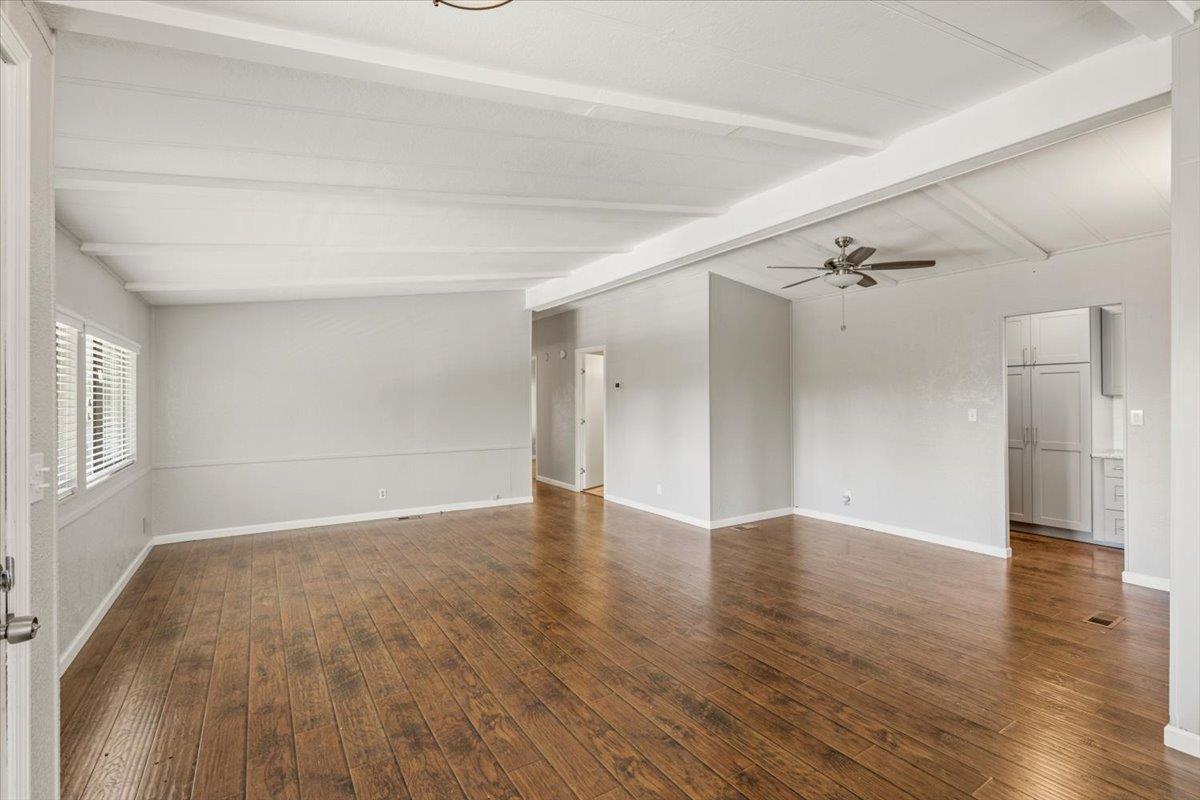 4420 Pleasant Valley Road, Unit 184 Diamond Springs, CA 95619 - Photo 15 of 28 wooden floor in an empty room with a window