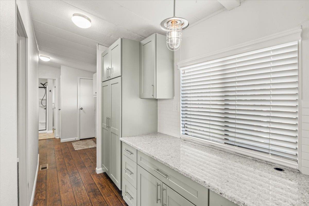 4420 Pleasant Valley Road, Unit 184 Diamond Springs, CA 95619 - Photo 17 of 28 a view of a kitchen cabinets a sink and wooden floor