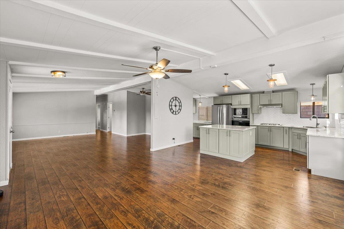 4420 Pleasant Valley Road, Unit 184 Diamond Springs, CA 95619 - Photo 9 of 28 a view of kitchen with cabinets and wooden floor
