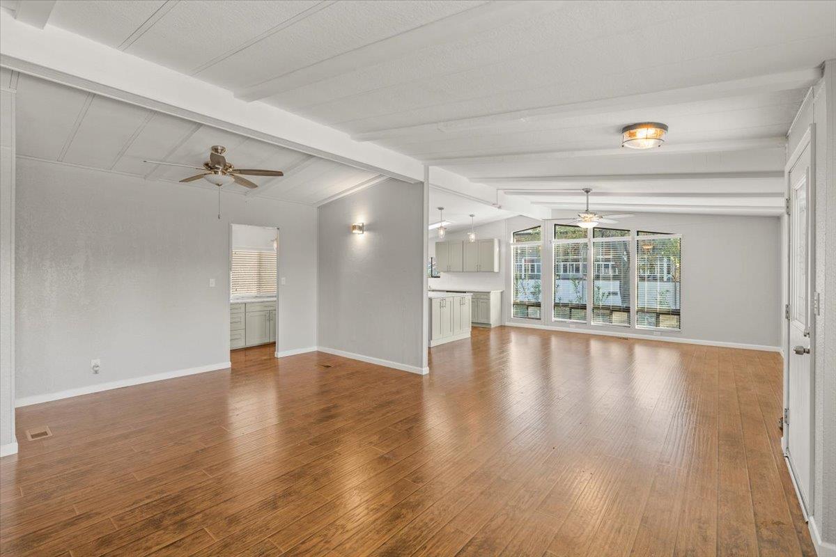 4420 Pleasant Valley Road, Unit 184 Diamond Springs, CA 95619 - Photo 10 of 28 wooden floor in an empty room with a window