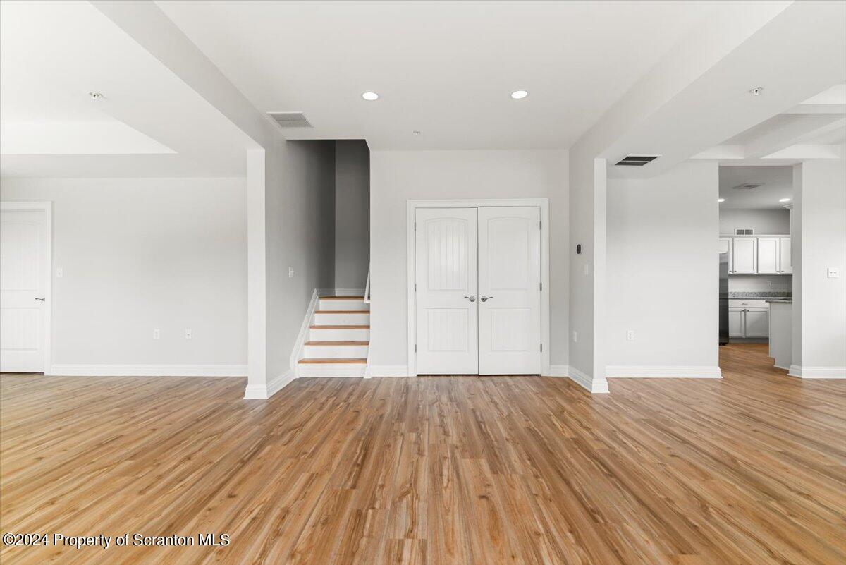 3 Dunbar Way Old Forge, PA 18518 - Photo 14 of 29 a view of a big room with wooden floor and windows