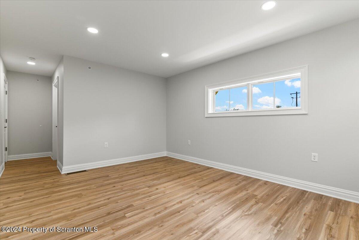 3 Dunbar Way Old Forge, PA 18518 - Photo 17 of 29 a view of empty room with wooden floor