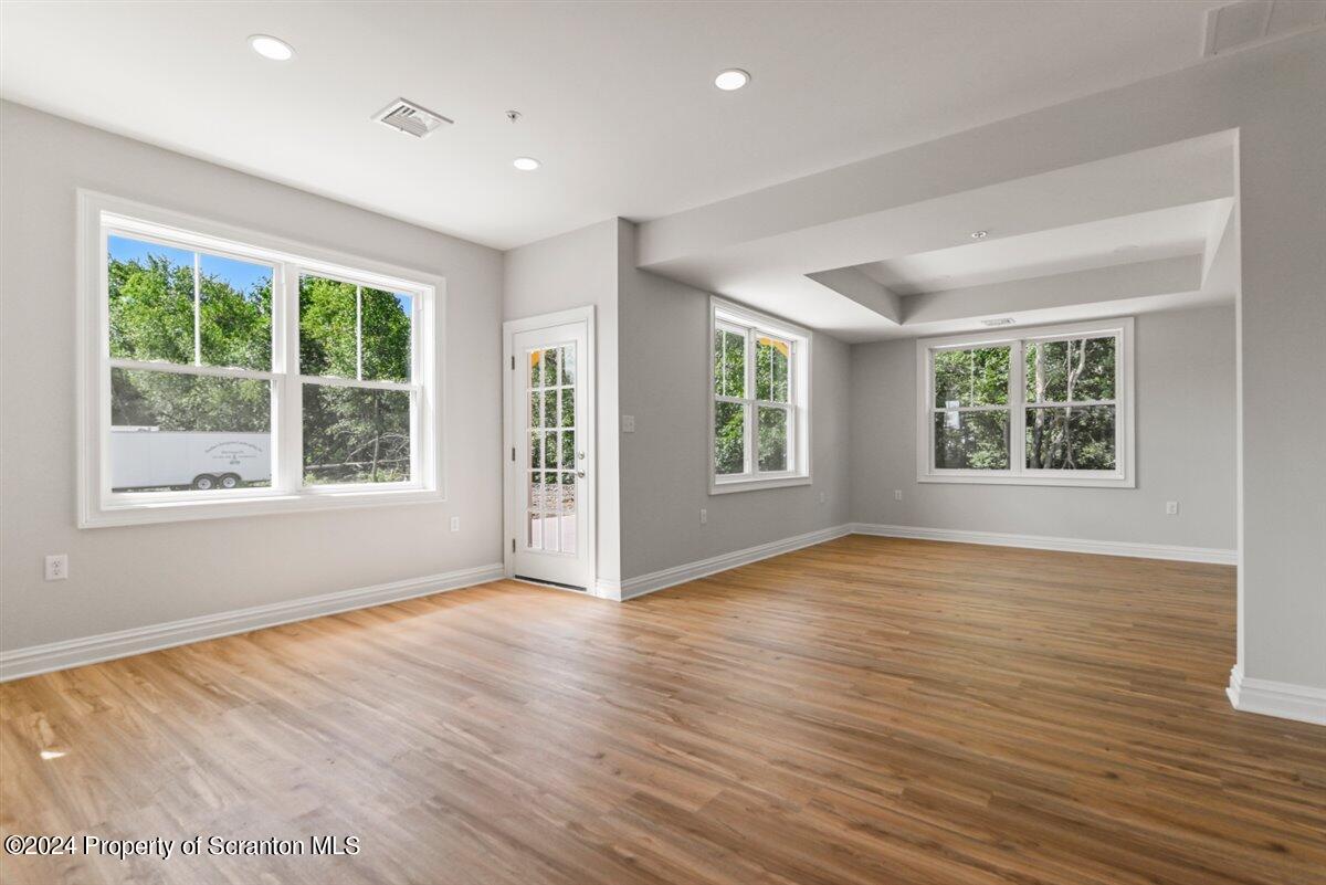 3 Dunbar Way Old Forge, PA 18518 - Photo 24 of 29 a view of an empty room with wooden floor and a window