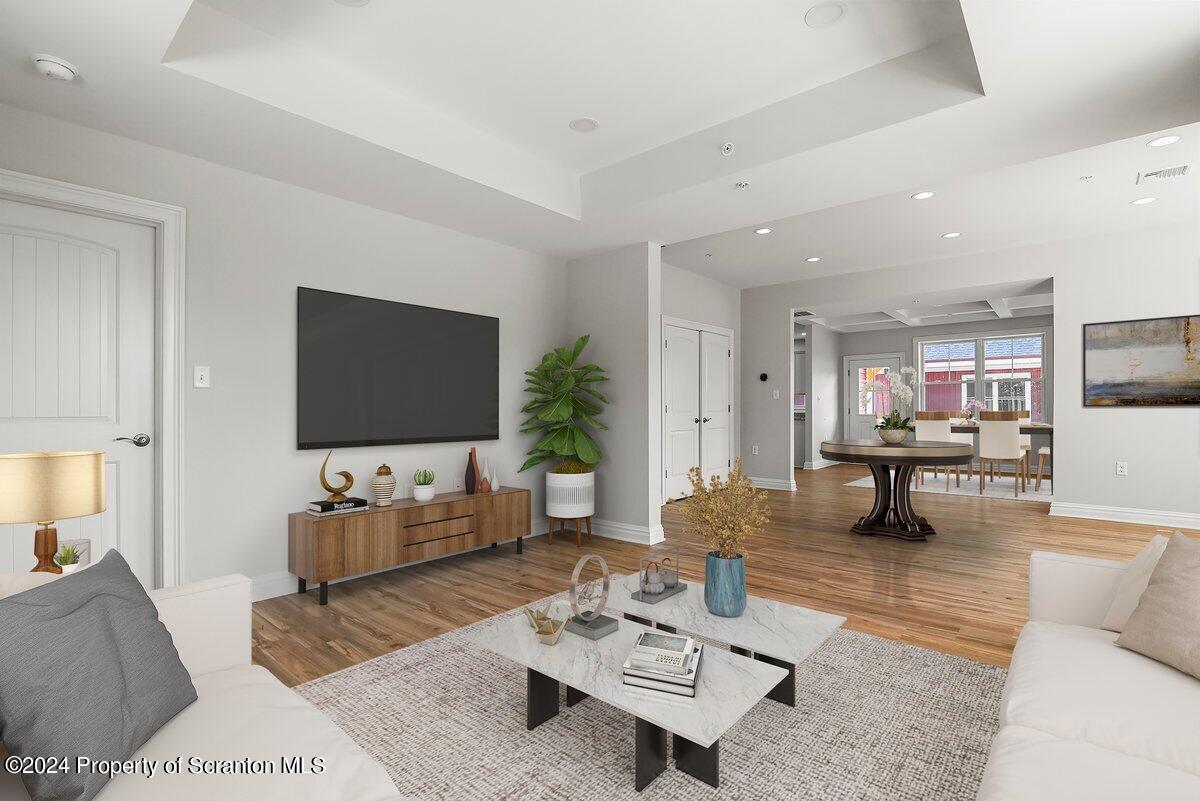 3 Dunbar Way Old Forge, PA 18518 - Photo 4 of 29 a living room with furniture and a flat screen tv