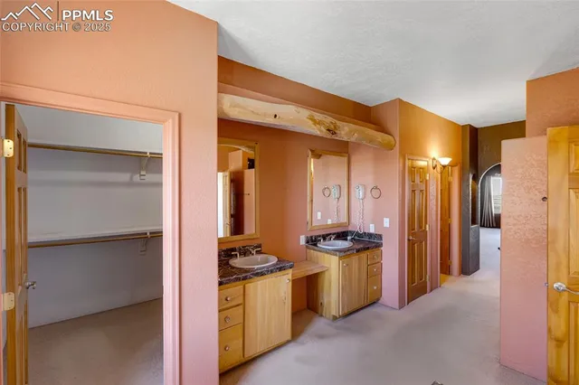 a kitchen with stainless steel appliances a refrigerator and a stove