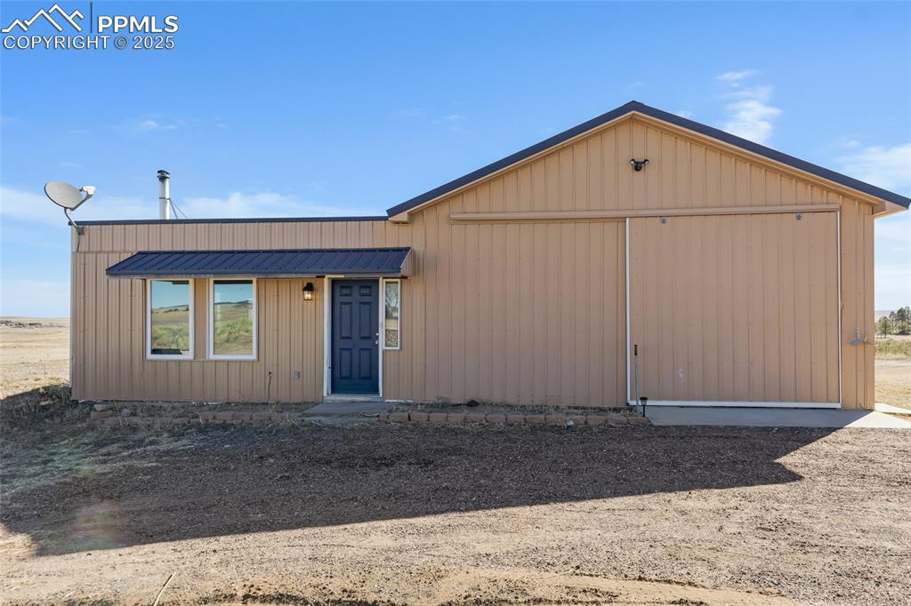 18450 Eurich Road Calhan, CO 80808 - Photo 32 of 48 a view of a house with a yard