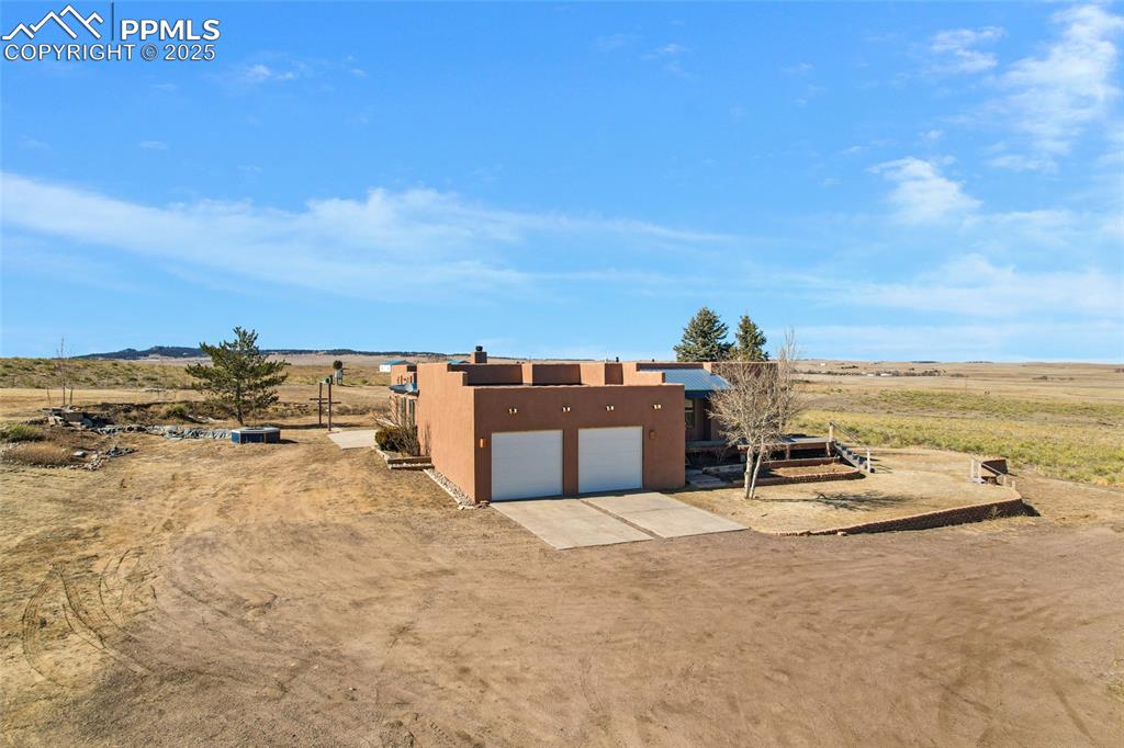 18450 Eurich Road Calhan, CO 80808 - Photo 45 of 48 a view of a ocean with a nearby beach