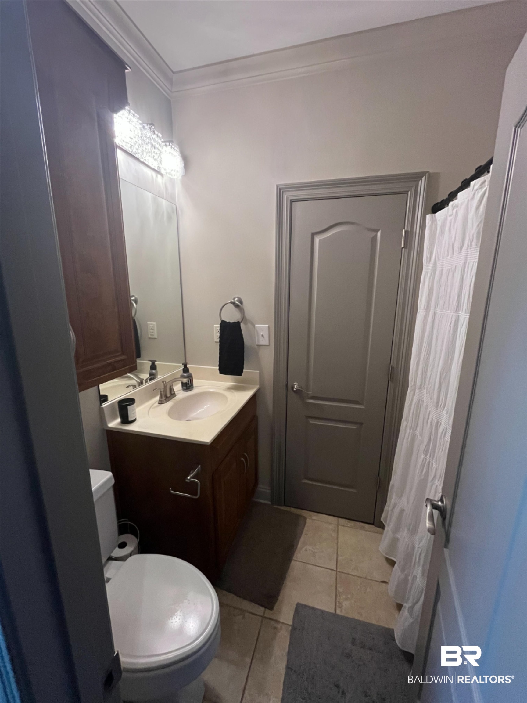 14316 Timber Ridge Drive Loxley, AL 36551 - Photo 17 of 23 Bathroom featuring tile patterned floors, ornamental molding, and vanity