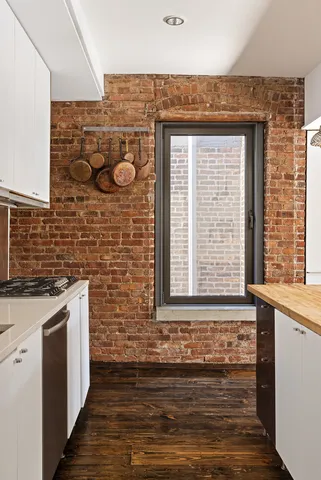 a view of a door and a window