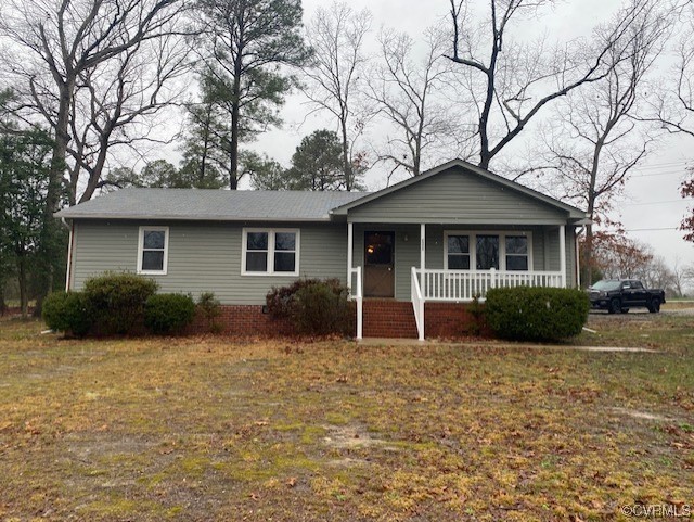 5600 Qualla Road Chesterfield, VA 23832 - Photo 1 of 6 a front view of a house with a yard