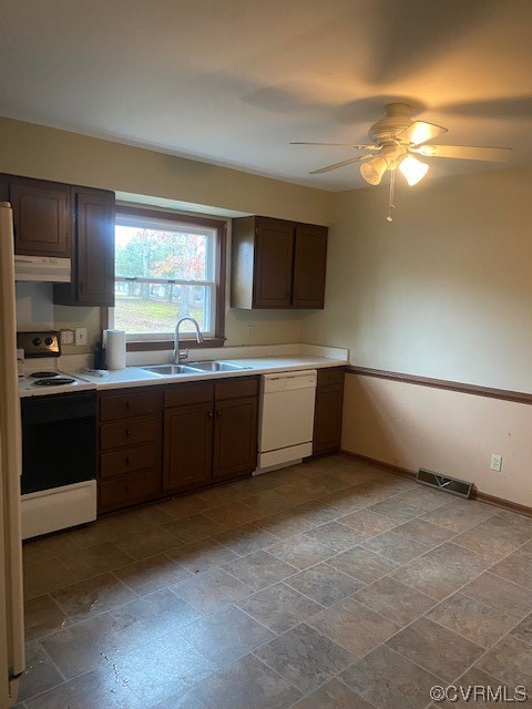 5600 Qualla Road Chesterfield, VA 23832 - Photo 3 of 6 a kitchen with a sink cabinets and window