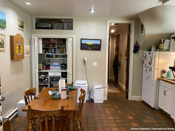 a view of a dining room with furniture