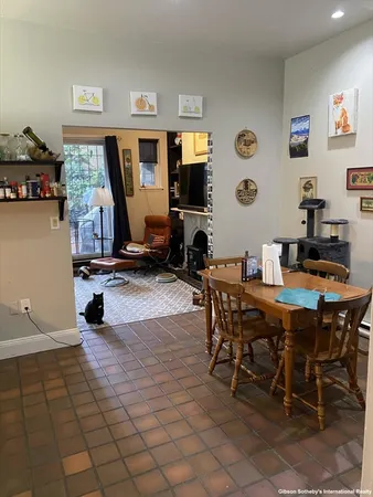 a view of a dining room with furniture