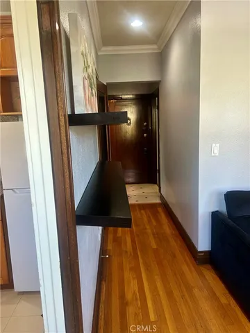 a view of a living room with a large window