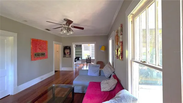 a living room with furniture and a window
